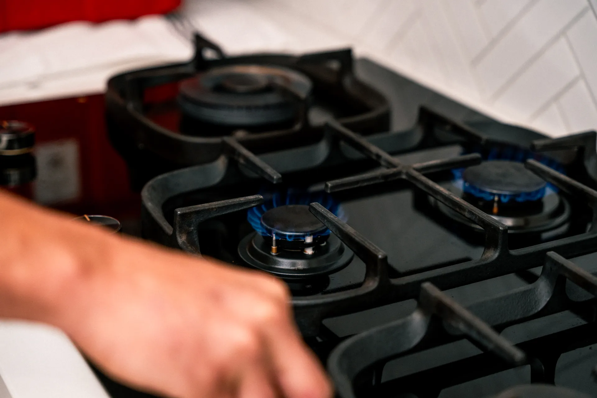 Licensed gas fitter installing a gas cooktop