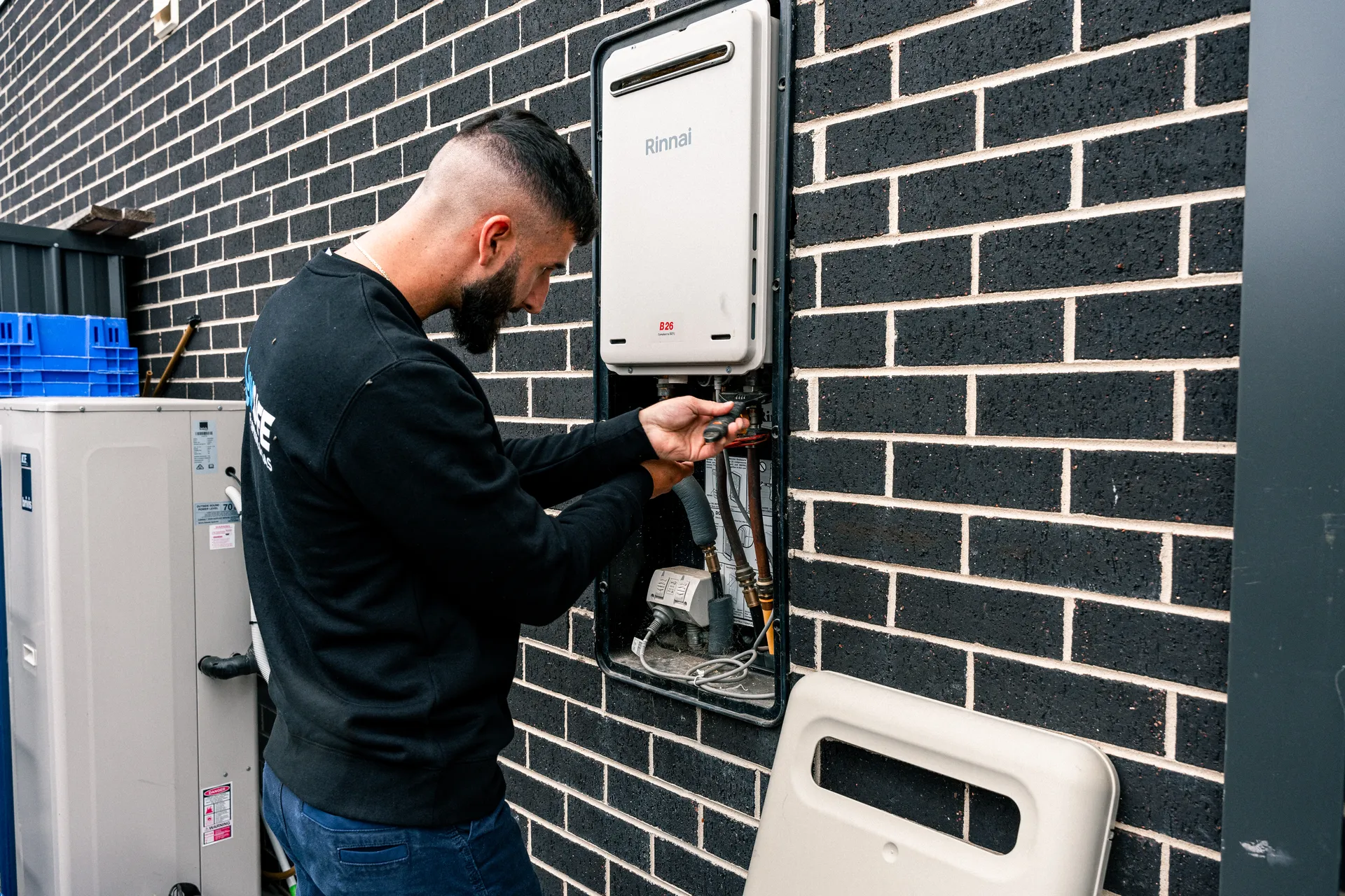 Gas Experts Melbourne technician at work on a gas appliance